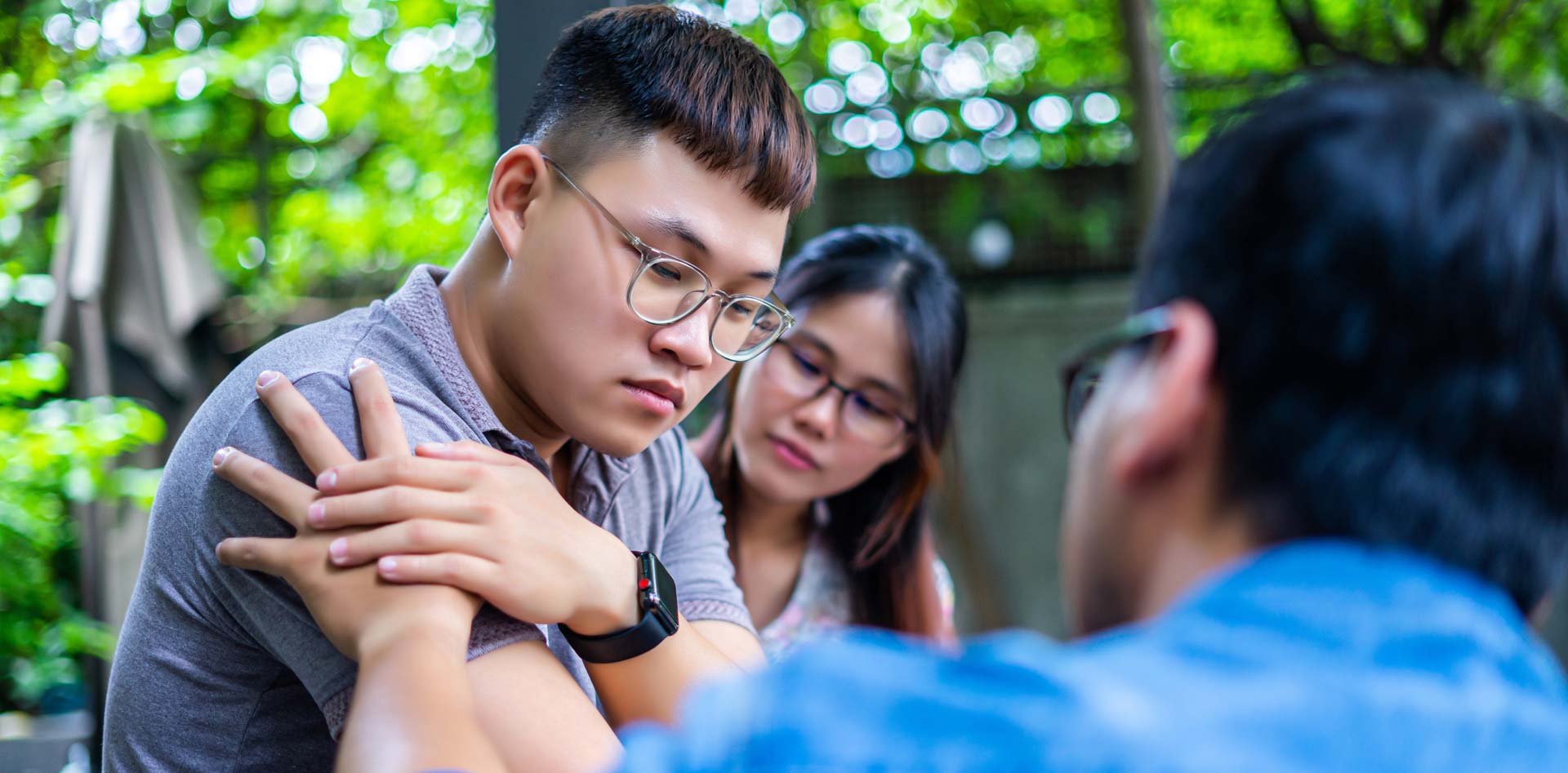 A sad male getting help